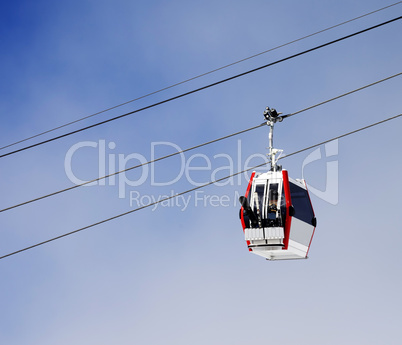 Gondola lift with ski and snowboards