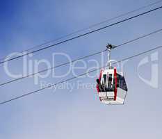 Gondola lift with ski and snowboards