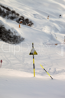 Ski slope at evening after snowfall
