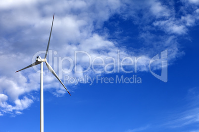 Wind turbine and blue sunlight sky