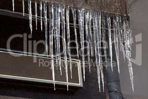 Roof of house with icicles