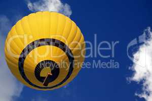 Hot air balloon on blue sunlight sky