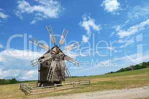 Old windmill on a picturesque hill