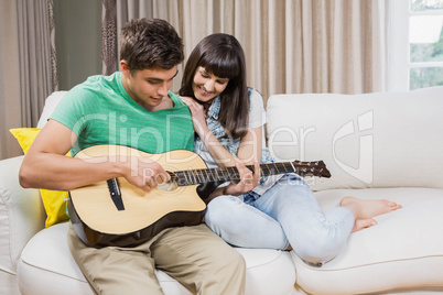 Couple at home relaxing on the sofa