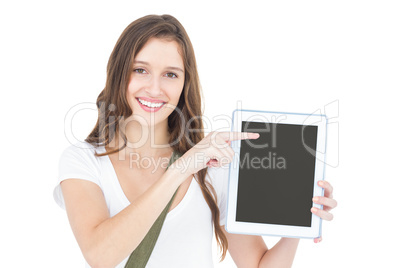 Portrait of happy female student showing tablet