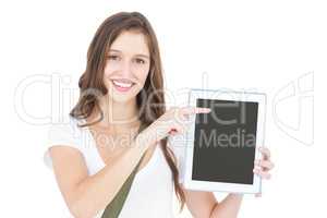 Portrait of happy female student showing tablet