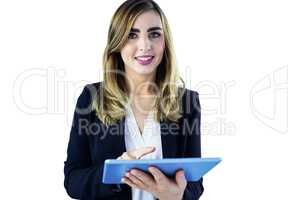 Smiling woman using tablet