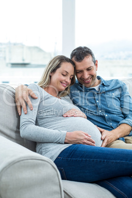 Couple sitting on sofa