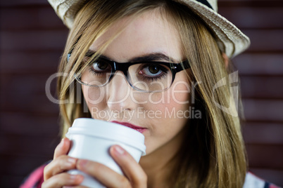 Woman drinking a beverage