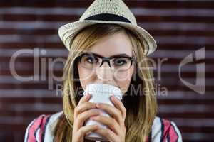 Woman drinking a beverage