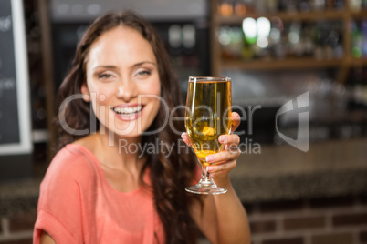 Pretty woman having a beer