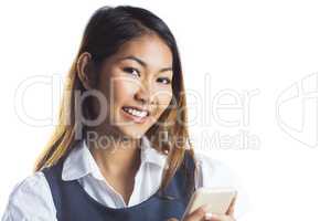Smiling businesswoman using a smartphone