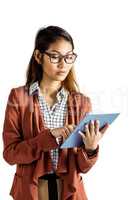 Businesswoman with eyeglasses using a tablet