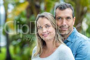 Couple looking away and smiling