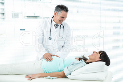 Doctor examining a pregnant woman