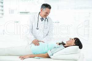 Doctor examining a pregnant woman