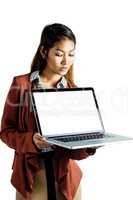 Smiling businesswoman showing a laptop