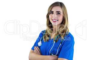 Smiling nurse with arms crossed