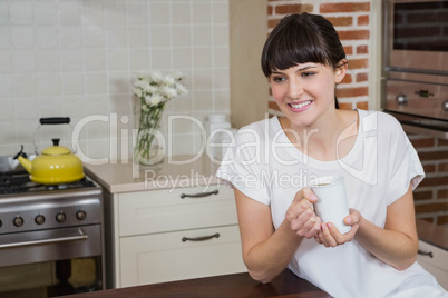 Young woman having a cup of coffee