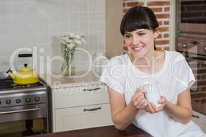 Young woman having a cup of coffee