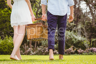 Young couple walking in garden