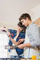 Woman pouring salt into utensil