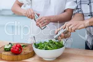 Pregnant couple in kitchen