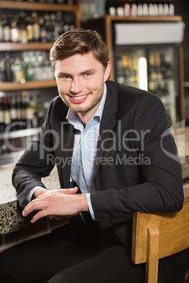 Handsome man smiling at camera