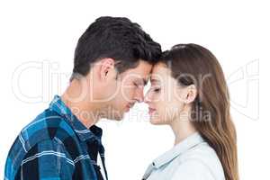 Couple standing head against head