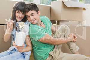 Young couple eating noodle