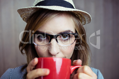 Pretty blonde woman having coffee