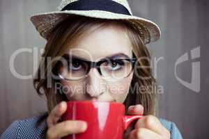 Pretty blonde woman having coffee