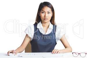 Serious businesswoman using a computer