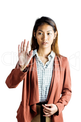 Serious businesswoman showing her hand