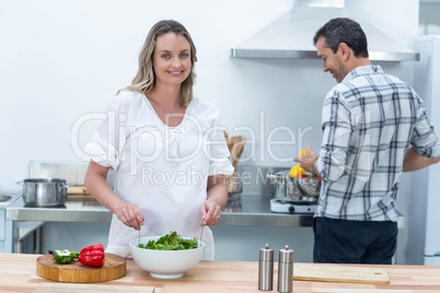 Pregnant couple in kitchen