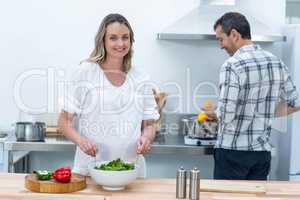 Pregnant couple in kitchen