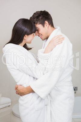 Young couple standing face to face