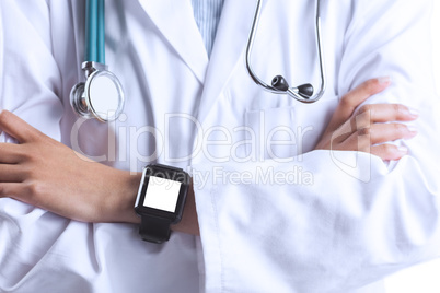 Close up of asian doctor showing her smart watch