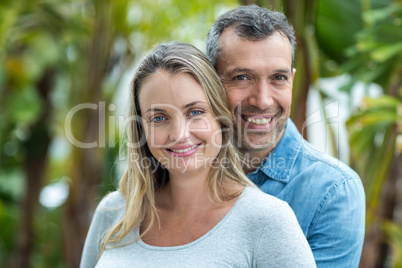 Couple looking at camera and smiling