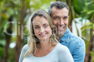 Couple looking at camera and smiling