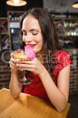 Pretty woman having a cocktail