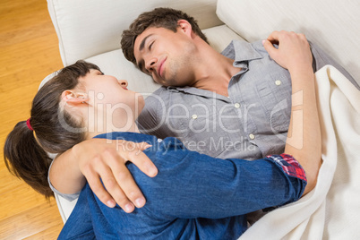 Couple at home relaxing on the sofa