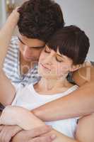 Young couple cuddling