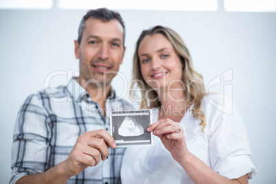 Pregnant couple at home