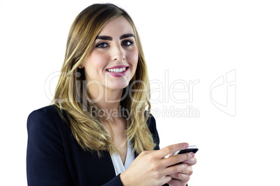 Smiling woman using smartphone