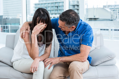 Therapist consoling a woman