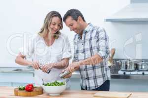 Pregnant couple in kitchen