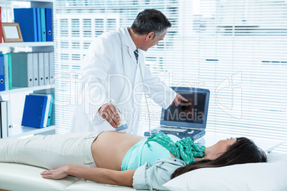 Pregnant woman undergoing ultrasound test