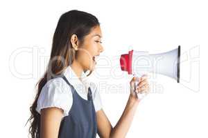 Businesswoman shooting through a megaphone