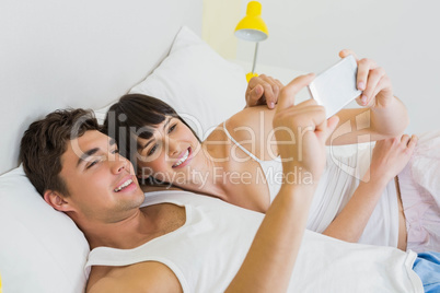 Couple looking at mobile phone